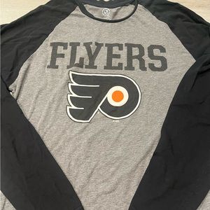 NHL men’s size medium Philadelphia Flyers raglan long sleeve tee.